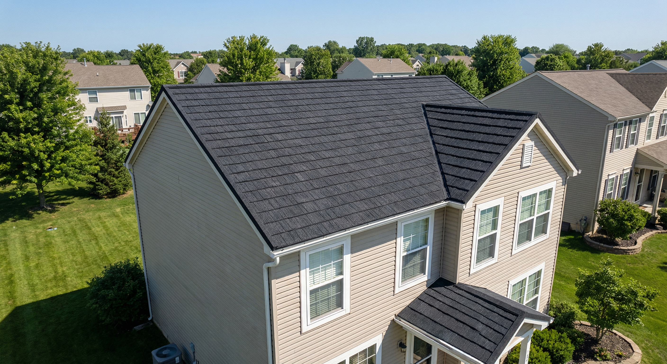 Relatable American suburban home with a clearly visible charcoal metal roof